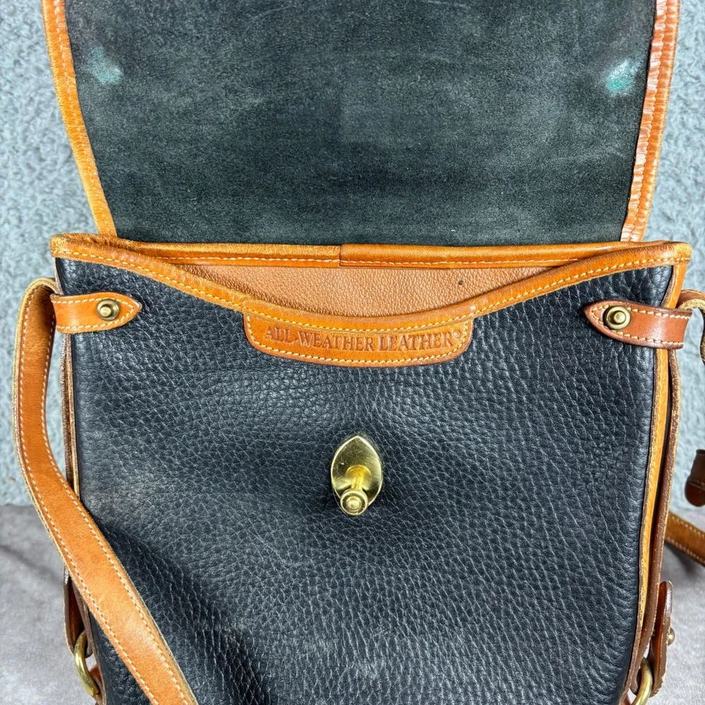 Dooney & Bourke Crossbody Bag Womens Medium Black Tan All Weather Leather Toggle